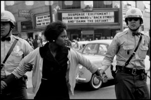 USA. Alabama. Birmingham. 1963. Arrest of a demonstrator. "Damn the Defiant!"